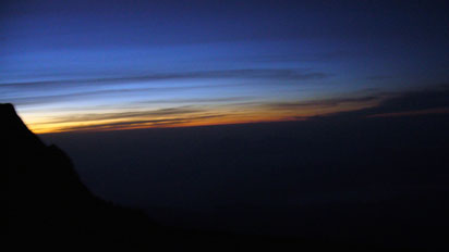 The sun begins to rise over Malaysia