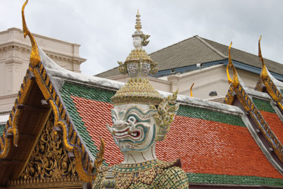 One of many colourful painted statues within the palace grounds