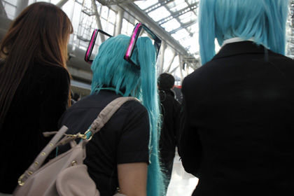 Popular Manga Cosplay at Comiket, not sure where this is from